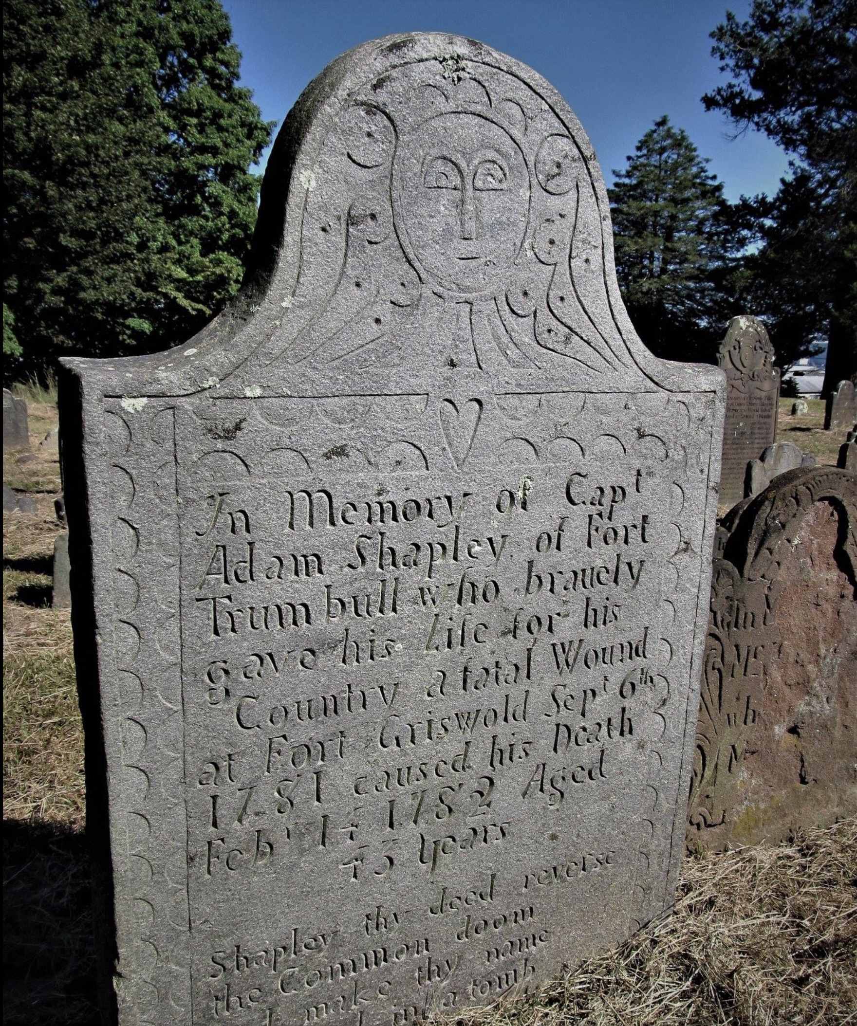 This photograph depicts the gravestone of Adam Shapley, one of the victims of the Fort Griswold Massacre.