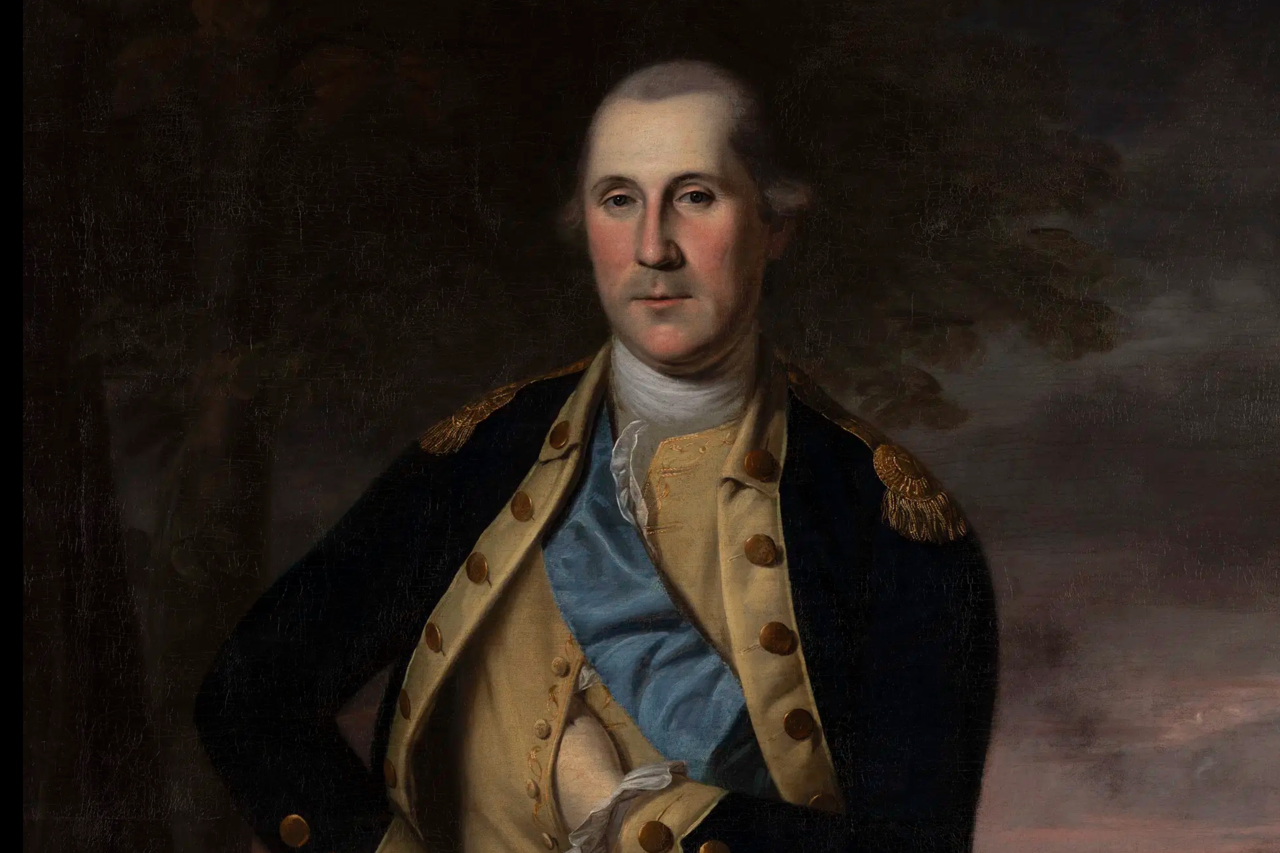 Portrait of an 18th-century military officer wearing a tan coat with gold trim, blue sash, and white cravat against a dark background.